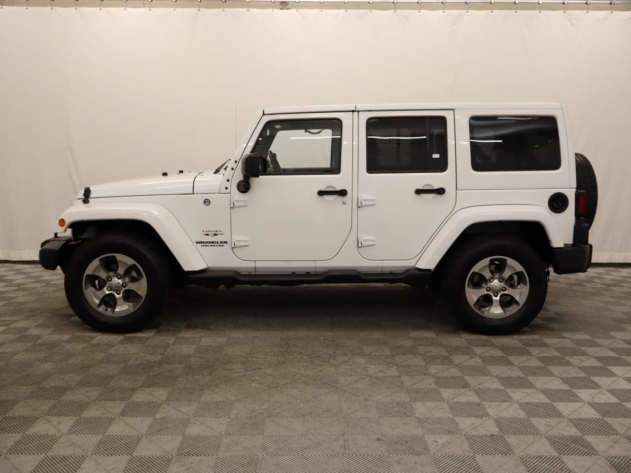 Used 2017 Jeep Wrangler Unlimited Sahara with VIN 1C4BJWEG3HL599842 for sale in Scottsdale, AZ