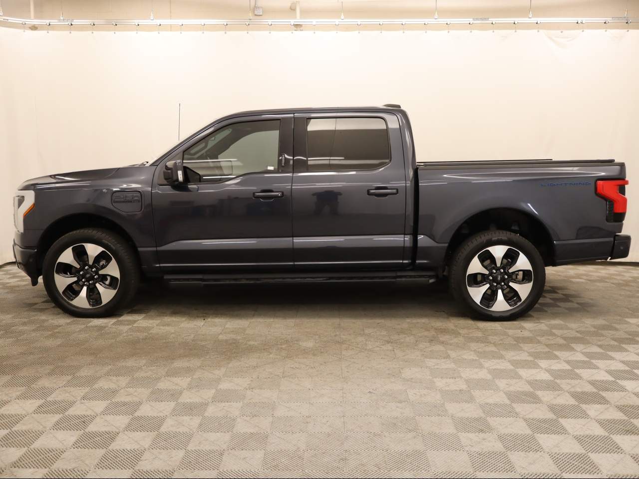Used 2022 Ford F-150 Lightning Platinum with VIN 1FT6W1EV0NWG11394 for sale in Scottsdale, AZ