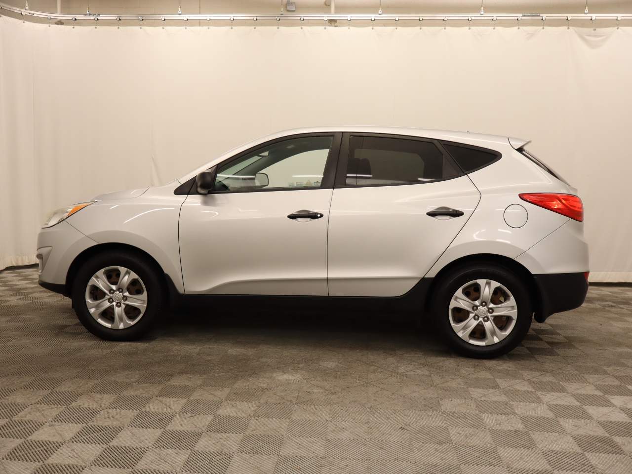 Used 2013 Hyundai Tucson GL with VIN KM8JT3AB9DU563734 for sale in Scottsdale, AZ