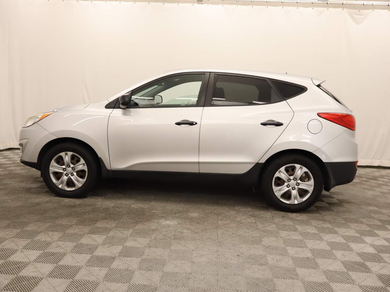 Used 2013 Hyundai Tucson GL with VIN KM8JT3AB9DU563734 for sale in Scottsdale, AZ